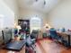 Spacious home office with hardwood floors, two desks, and a large window for plenty of natural light at 17901 Sw 25Th Avenue Rd, Ocala, FL 34473