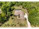 Expansive backyard with a screened-in pool and patio area at 21939 Sw 85Th Loop, Dunnellon, FL 34431