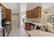 Kitchen featuring stainless steel appliances, countertops and breakfast nook at 21939 Sw 85Th Loop, Dunnellon, FL 34431