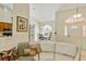 View of formal dining room from the living room, showcasing open layout and natural light at 21939 Sw 85Th Loop, Dunnellon, FL 34431