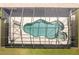 A screened-in kidney bean-shaped pool with an attached spa at 21939 Sw 85Th Loop, Dunnellon, FL 34431