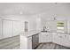 Bright kitchen features an island sink, granite countertops, and stainless appliances at 24354 Nw Water Oak Ave, Dunnellon, FL 34431