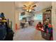 Bedroom with a loft bed, desk, and storage shelves and a carpet at 25292 Ne 132Nd Ln, Fort Mc Coy, FL 32134