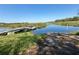 Picturesque waterfront featuring a private dock and boat launch, inviting peaceful days on the water at 25292 Ne 132Nd Ln, Fort Mc Coy, FL 32134