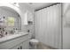Bright bathroom showcasing a modern vanity, ample storage, and a clean, well-maintained shower area at 2705 Sw 156Th Lane Rd, Ocala, FL 34473