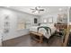 Cozy bedroom featuring stylish decor and a well-lit window, creating a relaxing atmosphere at 2705 Sw 156Th Lane Rd, Ocala, FL 34473