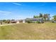 Charming single-story home boasting a lush front lawn and a long private driveway at 2705 Sw 156Th Lane Rd, Ocala, FL 34473