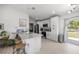 Modern kitchen with white cabinets, granite countertops, and stainless steel appliances at 2705 Sw 156Th Lane Rd, Ocala, FL 34473