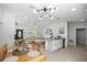 Open-concept living space blending kitchen, dining, and living room areas with modern decor at 2705 Sw 156Th Lane Rd, Ocala, FL 34473