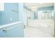 Light and bright bathroom features a large vanity, glass shower, tub, and tiled flooring at 2730 Sw 162Nd Street Rd, Ocala, FL 34473
