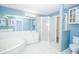 Large bathroom features a shower, white vanity, soaking tub, tile floor and lots of counter space at 2730 Sw 162Nd Street Rd, Ocala, FL 34473