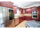 Well-appointed kitchen featuring stainless steel appliances, custom cabinetry, and ample counter space at 2730 Sw 162Nd Street Rd, Ocala, FL 34473