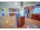 Kitchen with breakfast bar, stainless appliances, and updated cabinetry at 2730 Sw 162Nd Street Rd, Ocala, FL 34473