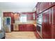 Gourmet kitchen boasting stainless steel appliances, custom cabinetry, and ample lighting at 2730 Sw 162Nd Street Rd, Ocala, FL 34473