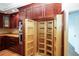 Gourmet kitchen features custom wood cabinetry with stainless steel appliances and a large pantry at 2730 Sw 162Nd Street Rd, Ocala, FL 34473