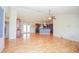 Inviting living room with hardwood flooring and an open floor plan leading to the kitchen at 2730 Sw 162Nd Street Rd, Ocala, FL 34473