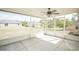 Relaxing covered patio offers backyard views and a ceiling fan at 2730 Sw 162Nd Street Rd, Ocala, FL 34473