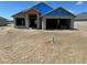 A new construction home with visible concrete walls and a partial roof under a clear blue sky at 3180 Ne 46Th Ave, Ocala, FL 34470