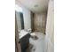 Nicely renovated bathroom with a new vanity, toilet and shower featuring modern tile surround at 38 Laurel Ct, Ocala, FL 34480