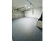 Spacious garage with painted floor at 38 Laurel Ct, Ocala, FL 34480