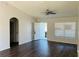 Spacious living room with vaulted ceilings, wood floors, and a welcoming entryway at 38 Laurel Ct, Ocala, FL 34480