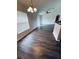 Bright and airy living room featuring vaulted ceilings, hardwood floors, and neutral paint at 38 Laurel Ct, Ocala, FL 34480
