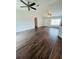 Bright and airy living room featuring vaulted ceilings, hardwood floors, and neutral paint at 38 Laurel Ct, Ocala, FL 34480