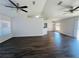 Spacious living room featuring vaulted ceilings, hardwood floors, and an open layout at 38 Laurel Ct, Ocala, FL 34480