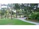 Picturesque park featuring covered picnic pavilions, walking paths, and lush green spaces at 38 Laurel Ct, Ocala, FL 34480