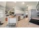 Bright kitchen featuring white cabinetry, stainless appliances, and an open layout at 4424 Se 14Th St, Ocala, FL 34471