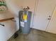 Efficient water heater in a garage space, ensuring reliable hot water supply for the home at 5606 Sw 107Th St, Ocala, FL 34476
