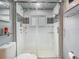 Close up of the bathroom featuring a shower with glass doors at 6403 Summit Dr, Orlando, FL 32810