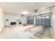 Spacious two-car garage with ample storage and natural light from window at 733 Se 67Th Ln, Ocala, FL 34480