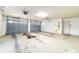 Large two-car garage with two doors, offering plenty of space for vehicles and storage at 733 Se 67Th Ln, Ocala, FL 34480