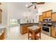 Bright kitchen with stainless steel appliances and island at 733 Se 67Th Ln, Ocala, FL 34480