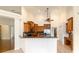 Open concept kitchen features granite countertops and wooden cabinetry at 733 Se 67Th Ln, Ocala, FL 34480