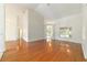 Bright and spacious living room with hardwood floors and large window at 733 Se 67Th Ln, Ocala, FL 34480