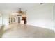 Inviting living room with tiled floor, arched windows, and ample natural light, perfect for relaxation at 733 Se 67Th Ln, Ocala, FL 34480