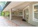 Wide open screened patio featuring a large covered space, with great view into the private back yard at 733 Se 67Th Ln, Ocala, FL 34480