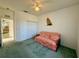 Bedroom with a futon, closet and ceiling fan offers ample space and comfort at 7421 Sw 110Th Pl, Ocala, FL 34476