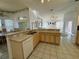 A well-appointed kitchen featuring ample counter space, a double basin sink, and a dishwasher at 7421 Sw 110Th Pl, Ocala, FL 34476