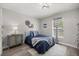 Nautical themed bedroom with comfortable furniture, decor and a nice ceiling fan at 77 Locust Dr, Ocala, FL 34472