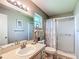 Well-lit bathroom with a shower/tub combo and neutral finishes, offering comfort and convenience at 8351 Sw 93Rd Ln # D, Ocala, FL 34481