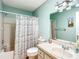 Tranquil bathroom with tiled shower/tub, single vanity, and soft paint color at 8351 Sw 93Rd Ln # D, Ocala, FL 34481