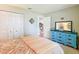 Bright bedroom with closet and dresser, providing a peaceful retreat at 8351 Sw 93Rd Ln # D, Ocala, FL 34481