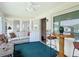 Cozy sunroom with ample seating, natural light, and views of the outdoors at 8351 Sw 93Rd Ln # D, Ocala, FL 34481