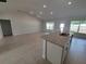 Modern kitchen featuring stainless steel appliances, granite countertops, and white cabinetry at 8468 Sw 59Th Ter, Ocala, FL 34476