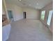 Open-concept living room with tile floors, recessed lighting, and granite countertops, ideal for entertaining at 8482 Sw 59Th Ter, Ocala, FL 34476