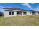 Backyard with a patio, and lush lawn at 8483 Sw 59Th Ter, Ocala, FL 34476