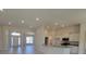 Spacious kitchen with stainless appliances, granite counters and tile floors that opens to the living areas at 8483 Sw 59Th Ter, Ocala, FL 34476